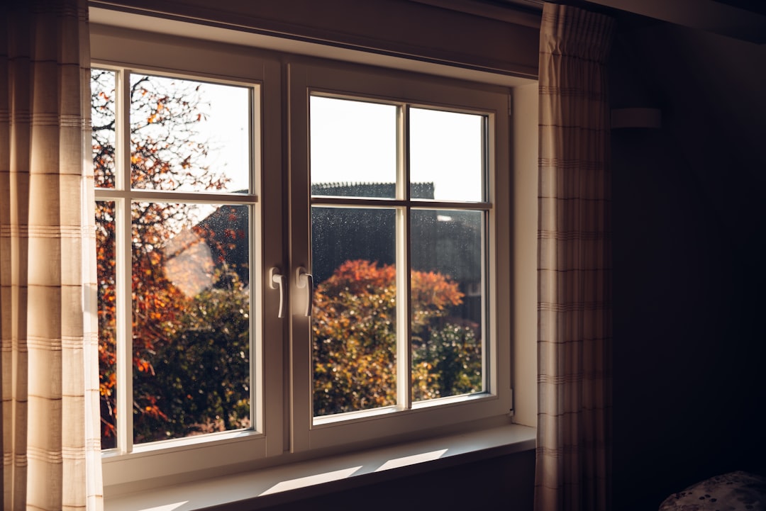 about-img white-wooden-framed-glass-window-um6afkjsjpq